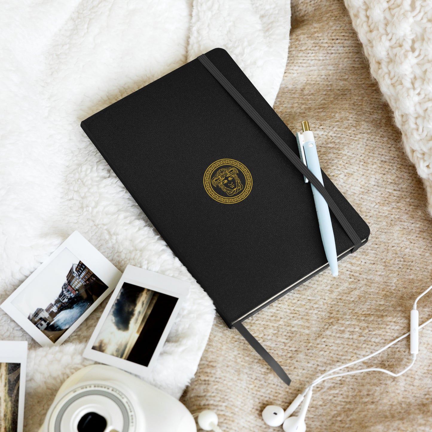 Stylish Hardcover bound notebook in black with distinct Medusa Emblem